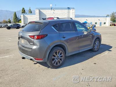 Trzecie zdjęcie samochodu z tyłu: 2019 MAZDA CX-5 GRAND TOURING VIN:JM3KFADM5K1504106 - miniatura
