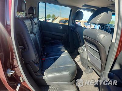 Zdjęcie 11 z 13 samochodu: 2011 HONDA PILOT EXL VIN:5FNYF4H51BB071611 - miniatura