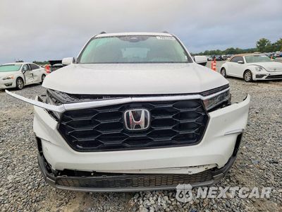 Piąte zdjęcie samochodu w środku: 2024 HONDA PILOT TOURING VIN:5FNYG2H72RB001161 - miniatura