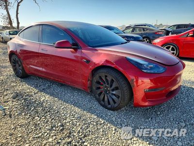 Czwarte zdjęcie samochodu z boku: 2022 TESLA MODEL 3 VIN:5YJ3E1EC0NF242044 - miniatura