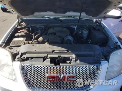 Zdjęcie 12 z 13 samochodu: 2008 GMC YUKON XL K1500 VIN:1GKFK16348J200854 - miniatura