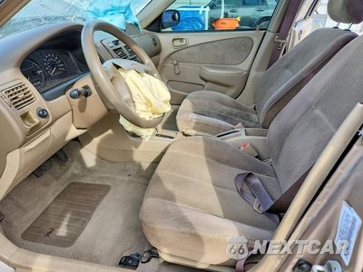 Zdjęcie 7 z 13 samochodu: 2002 TOYOTA COROLLA CE VIN:1NXBR12E02Z595727 - miniatura