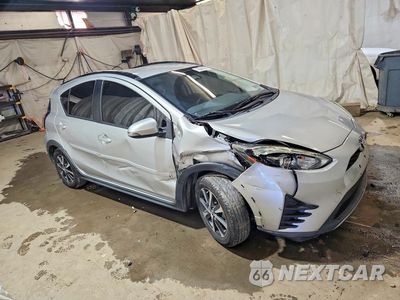 Czwarte zdjęcie samochodu z boku: 2018 TOYOTA PRIUS C ONE VIN:JTDKDTB34J1604443 - miniatura
