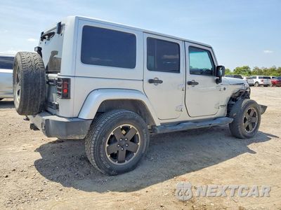 Trzecie zdjęcie samochodu z tyłu: 2012 JEEP WRANGLER UNLIMITED SAHARA VIN:1C4HJWEGXCL258411 - miniatura