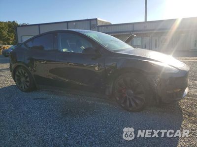 Czwarte zdjęcie samochodu z boku: 2023 TESLA MODEL Y VIN:7SAYGDEF5PF590827 - miniatura