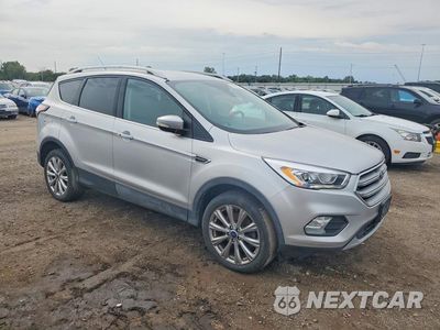 Czwarte zdjęcie samochodu z boku: 2017 FORD ESCAPE TITANIUM VIN:1FMCU9JD8HUB93831 - miniatura