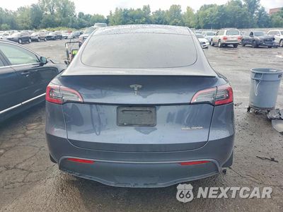 Zdjęcie 6 z 12 samochodu: 2023 TESLA MODEL Y VIN:7SAYGDEF2PF860841 - miniatura