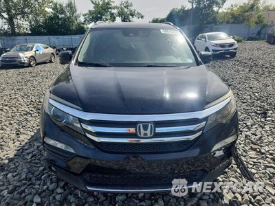Piąte zdjęcie samochodu w środku: 2016 HONDA PILOT TOURING VIN:5FNYF6H9XGB001093 - miniatura