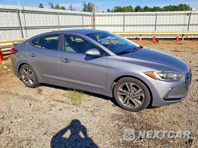 Czwarte zdjęcie samochodu z boku: 2017 HYUNDAI ELANTRA LIMITED VIN:5NPD84LF4HH013253 - miniatura