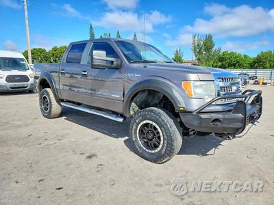Czwarte zdjęcie samochodu z boku: 2014 FORD F150 SUPERCREW VIN:1FTFW1ET8EFB55062 - miniatura