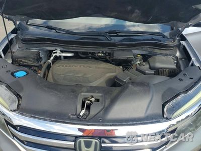 Zdjęcie 12 z 13 samochodu: 2018 HONDA PILOT TOURING VIN:5FNYF6H96JB045986 - miniatura