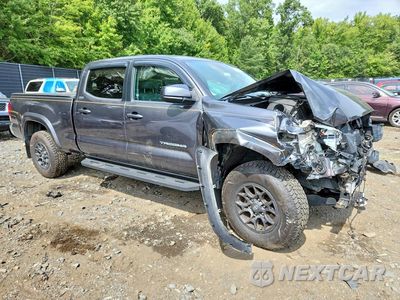 Czwarte zdjęcie samochodu z boku: 2018 TOYOTA TACOMA SR5 V6 VIN:3TMDZ5BN6JM040613 - miniatura