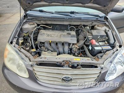 Zdjęcie 11 z 12 samochodu: 2004 TOYOTA COROLLA CE VIN:2T1BR32E14C181128 - miniatura