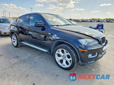 Czwarte zdjęcie samochodu z boku: 2014 BMW X6 XDRIVE35I VIN:5UXFG2C51E0C43172 - miniatura