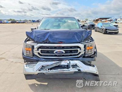 Piąte zdjęcie samochodu w środku: 2022 FORD F150 XLT VIN:1FTEW1C85NFB36494 - miniatura