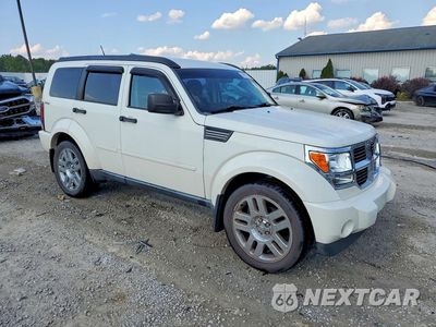 Czwarte zdjęcie samochodu z boku: 2010 DODGE NITRO SE VIN:1D4PU2GKXAW107094 - miniatura