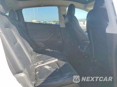 Zdjęcie 10 z 13 samochodu: 2022 TESLA MODEL Y VIN:7SAYGAEE9NF490037 - miniatura