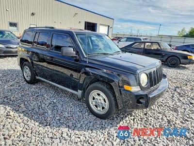 Czwarte zdjęcie samochodu z boku: 2010 JEEP PATRIOT SPORT VIN:1J4NF2GB6AD657879 - miniatura