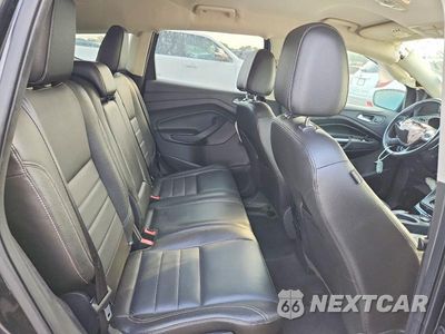 Zdjęcie 11 z 13 samochodu: 2014 FORD ESCAPE TITANIUM VIN:1FMCU0J9XEUB96507 - miniatura