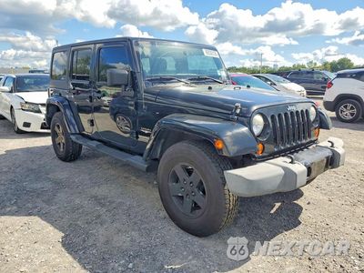 Czwarte zdjęcie samochodu z boku: 2012 JEEP WRANGLER UNLIMITED SAHARA VIN:1C4BJWEG1CL279766 - miniatura