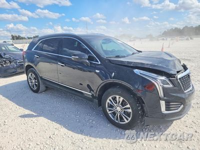 Czwarte zdjęcie samochodu z boku: 2021 CADILLAC XT5 PREMIUM LUXURY VIN:1GYKNCRS4MZ106978 - miniatura