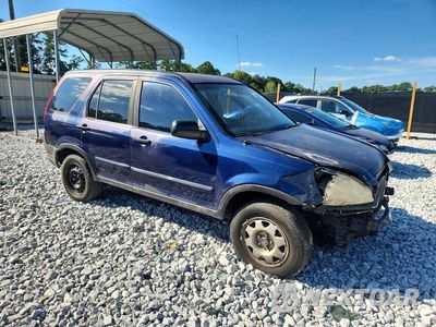 Czwarte zdjęcie samochodu z boku: 2002 HONDA CR-V LX VIN:JHLRD68432C013710 - miniatura