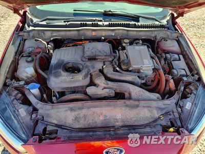 Zdjęcie 11 z 12 samochodu: 2016 FORD FUSION TITANIUM PHEV VIN:3FA6P0SU2GR315047 - miniatura