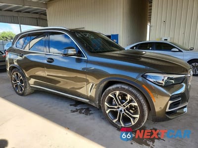 Czwarte zdjęcie samochodu z boku: 2022 BMW X5 SDRIVE 40I VIN:5UXCR4C07N9K03748 - miniatura