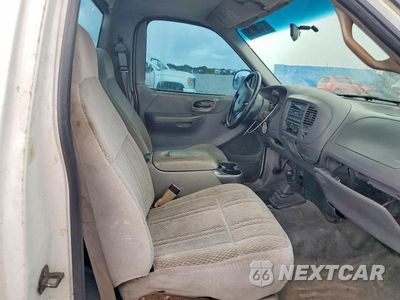 Zdjęcie 10 z 12 samochodu: 1999 FORD F250 VIN:1FTPF28L4XNC02554 - miniatura