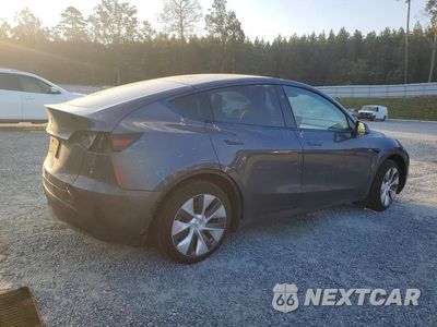 Trzecie zdjęcie samochodu z tyłu: 2023 TESLA MODEL Y VIN:7SAYGDED9PF958473 - miniatura