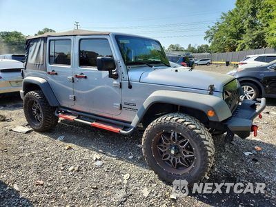 Czwarte zdjęcie samochodu z boku: 2015 JEEP WRANGLER UNLIMITED SPORT VIN:1C4BJWDG1FL771185 - miniatura