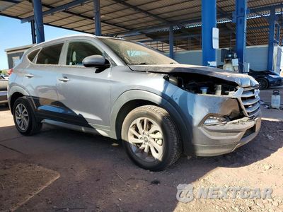 Czwarte zdjęcie samochodu z boku: 2017 HYUNDAI TUCSON SE VIN:KM8J33A40HU330218 - miniatura