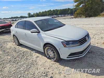 Czwarte zdjęcie samochodu z boku: 2017 VOLKSWAGEN JETTA S VIN:3VW2B7AJ2HM242281 - miniatura