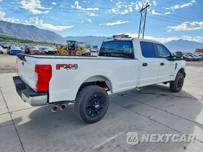 Trzecie zdjęcie samochodu z tyłu: 2022 FORD F250 SUPER DUTY VIN:1FT7W2BT4NEF89628 - miniatura