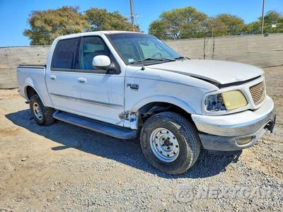 Czwarte zdjęcie samochodu z boku: 2002 FORD F150 SUPERCREW VIN:1FTRW08L12KD16423 - miniatura