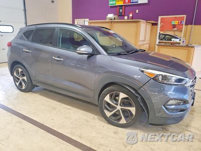 Czwarte zdjęcie samochodu z boku: 2016 HYUNDAI TUCSON LIMITED VIN:KM8J3CA20GU073039 - miniatura