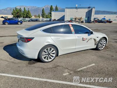 Trzecie zdjęcie samochodu z tyłu: 2019 TESLA MODEL 3 VIN:5YJ3E1EA5KF432125 - miniatura
