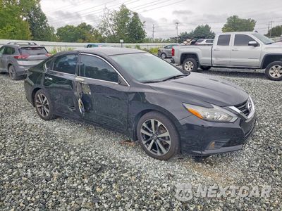 Czwarte zdjęcie samochodu z boku: 2017 NISSAN ALTIMA 2.5 SR VIN:1N4AL3AP1HC490246 - miniatura