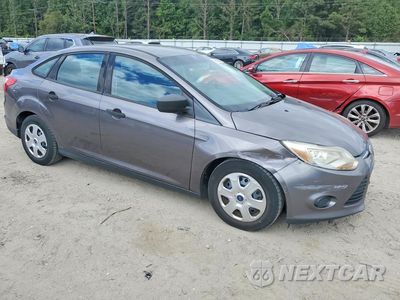 Czwarte zdjęcie samochodu z boku: 2012 FORD FOCUS S VIN:1FAHP3E21CL277100 - miniatura