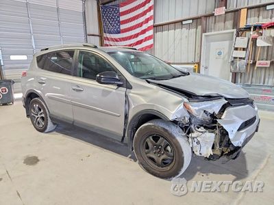 Czwarte zdjęcie samochodu z boku: 2016 TOYOTA RAV 4 VIN:2T3ZFREV6GW270662 - miniatura