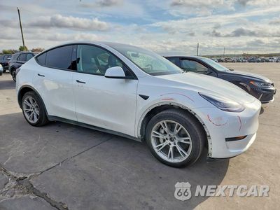 Czwarte zdjęcie samochodu z boku: 2023 TESLA MODEL Y VIN:7SAYGDEE3PA069559 - miniatura