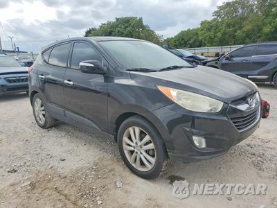 Czwarte zdjęcie samochodu z boku: 2013 HYUNDAI TUCSON LIMITED VIN:KM8JU3AC4DU588823 - miniatura