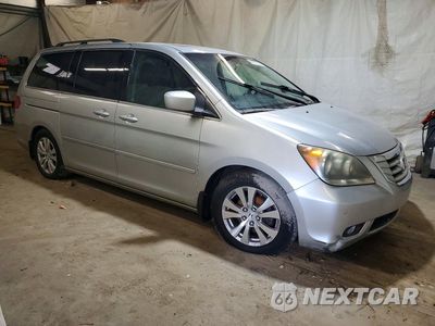 Czwarte zdjęcie samochodu z boku: 2010 HONDA ODYSSEY TOURING VIN:5FNRL3H99AB090111 - miniatura
