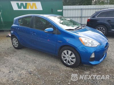 Czwarte zdjęcie samochodu z boku: 2014 TOYOTA PRIUS C TWO VIN:JTDKDTB32E1575031 - miniatura