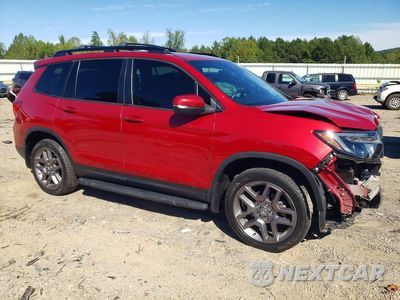 Czwarte zdjęcie samochodu z boku: 2023 HONDA PASSPORT EXL VIN:5FNYF8H52PB032105 - miniatura