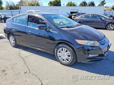 Czwarte zdjęcie samochodu z boku: 2010 HONDA INSIGHT LX VIN:JHMZE2H54AS035018 - miniatura