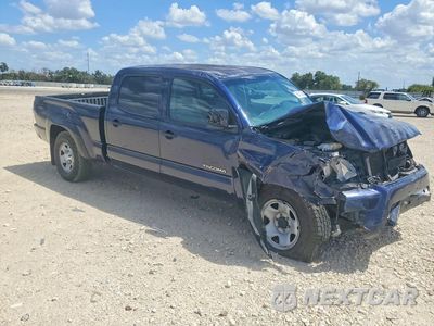 Czwarte zdjęcie samochodu z boku: 2013 TOYOTA TACOMA DOUBLE CAB LONG BED VIN:3TMMU4FN3DM060986 - miniatura
