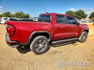 Trzecie zdjęcie samochodu z tyłu: 2024 GMC CANYON AT4 VIN:1GTP6DEK6R1287592 - miniatura