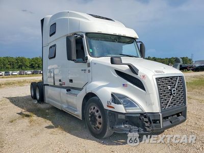 Czwarte zdjęcie samochodu z boku: 2021 VOLVO VNL SEMI TRUCK VIN:4V4NC9EH3MN283474 - miniatura