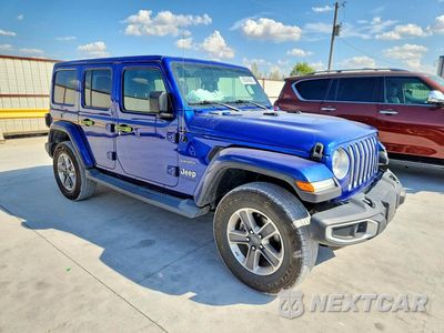 Czwarte zdjęcie samochodu z boku: 2019 JEEP WRANGLER UNLIMITED SAHARA VIN:1C4HJXEN3KW620239 - miniatura